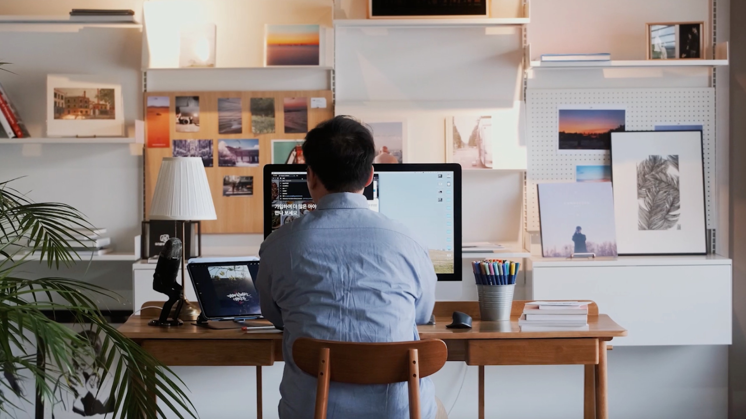 Person working at desk, for Logitech Worklife Upgraded